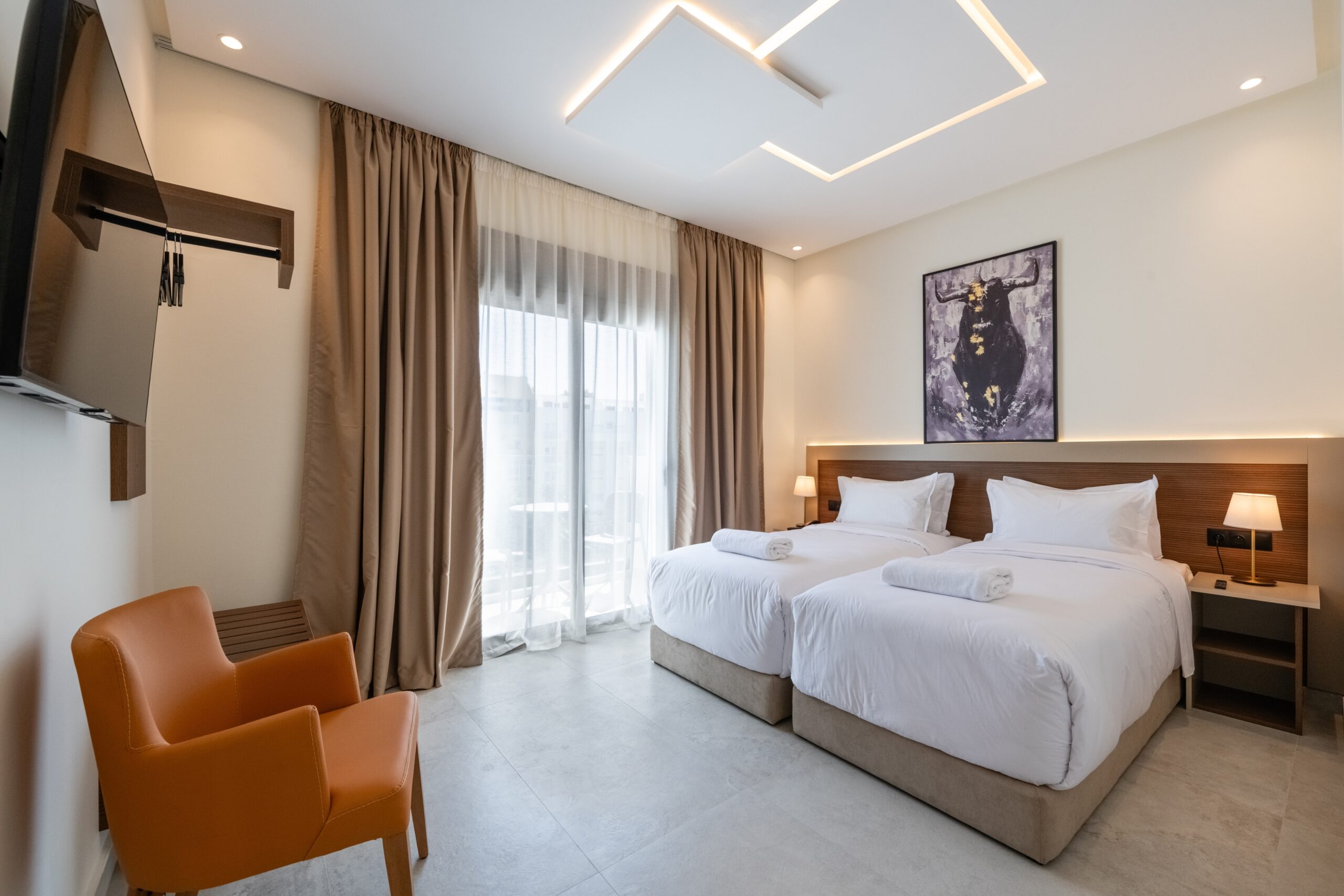 Private bathroom at Hotel El Toro Tangier with modern shower and amenities