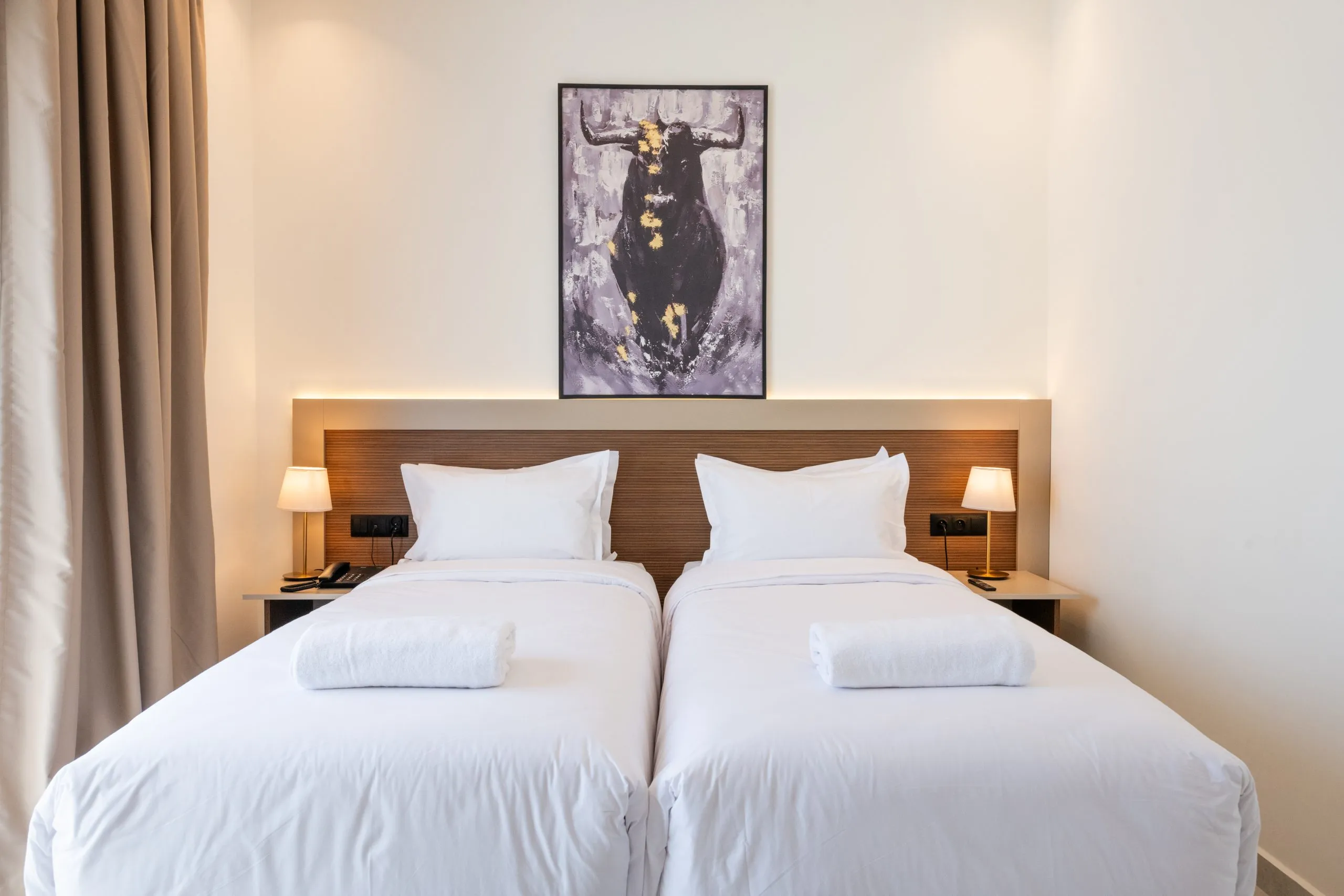 Modern double room at Hotel El Toro Tangier with comfortable bed and city view